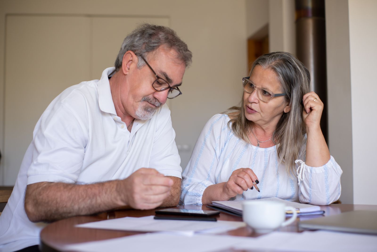 Older couple planning together at home