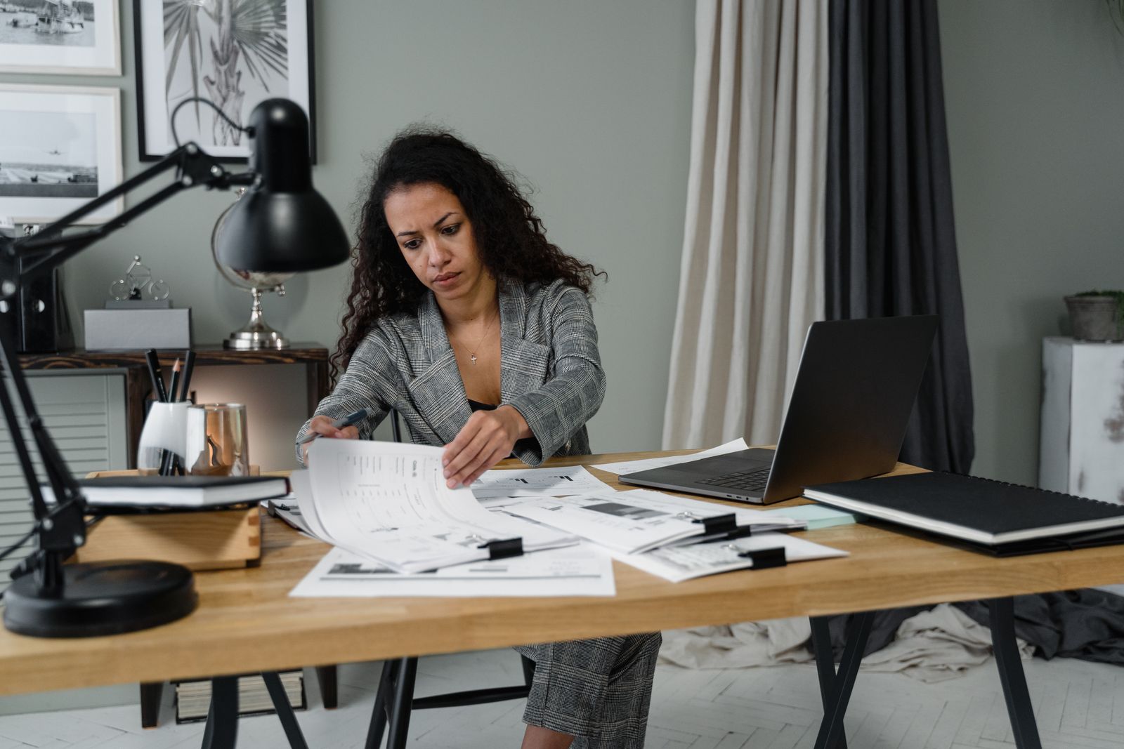 Professional reviewing tax and withdrawal planning documents